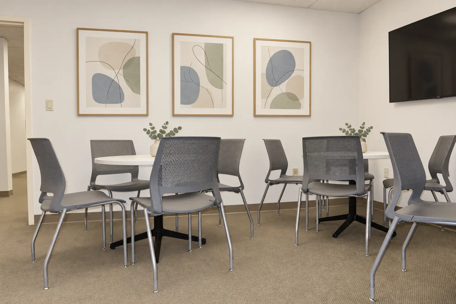 Refined multipurpose room with art and TV 4
