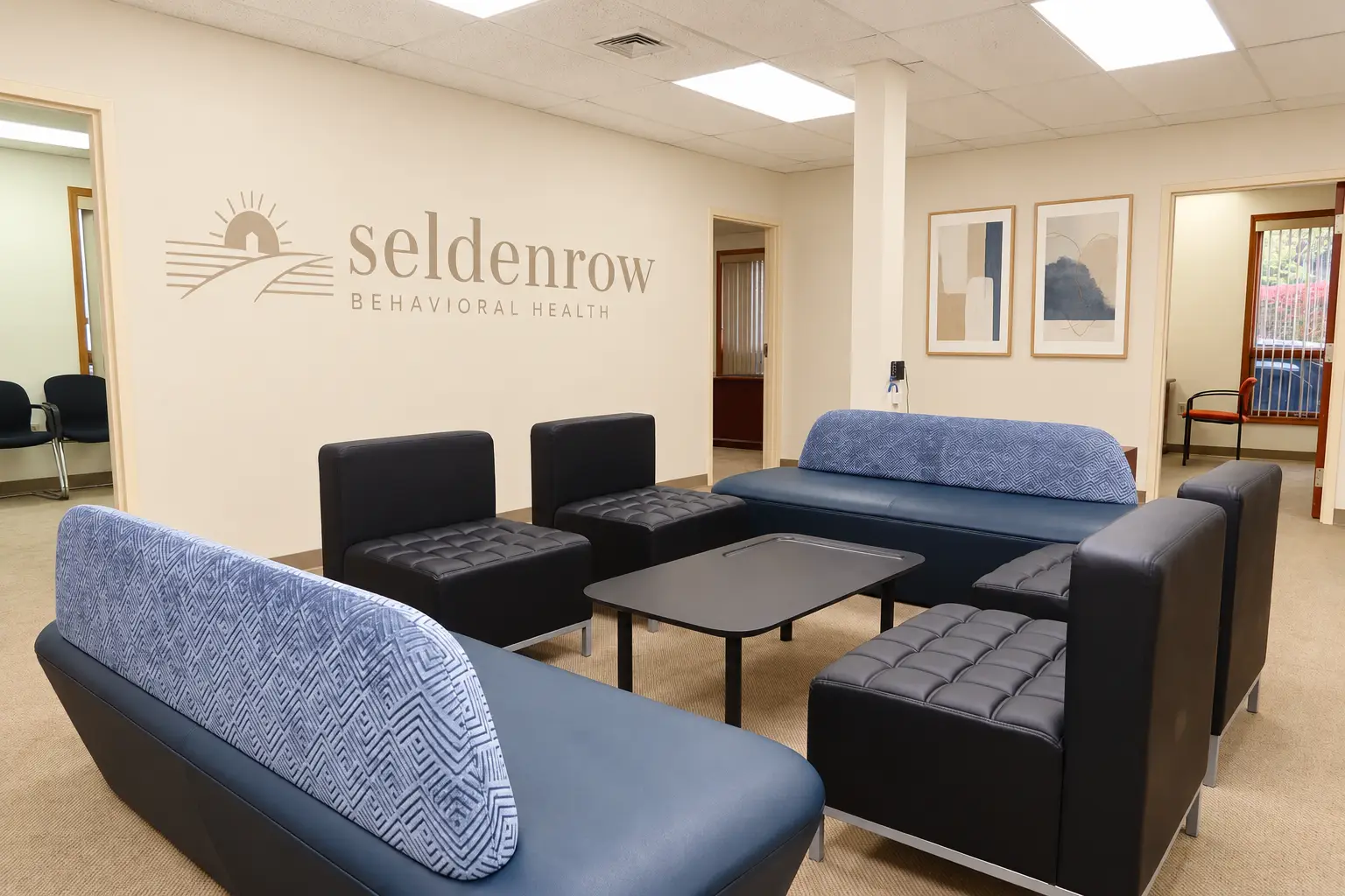Warm toned lounge with Seldenrow logo 2